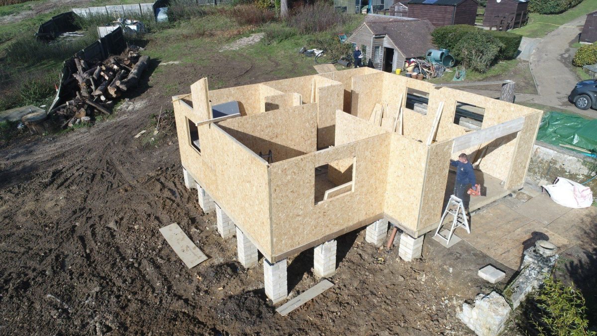 SIP wall panels erected on a garden building during construction