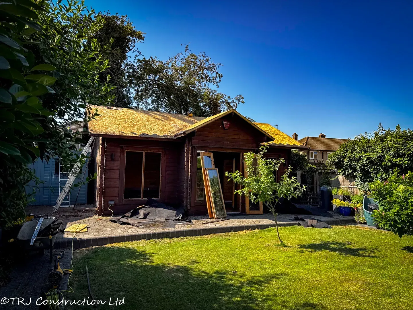 Old timber garden building before the Waltham Cross annexe project